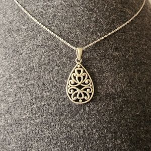 Sterling Silver 18" necklace with filigree teardrop pendant.